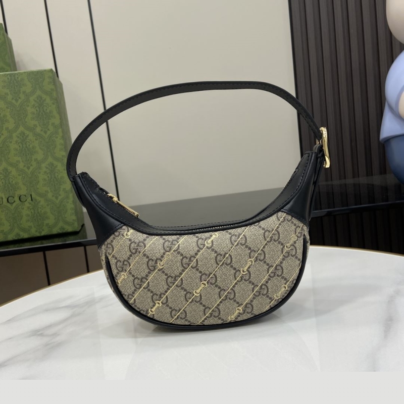 G*u*i top handle bags